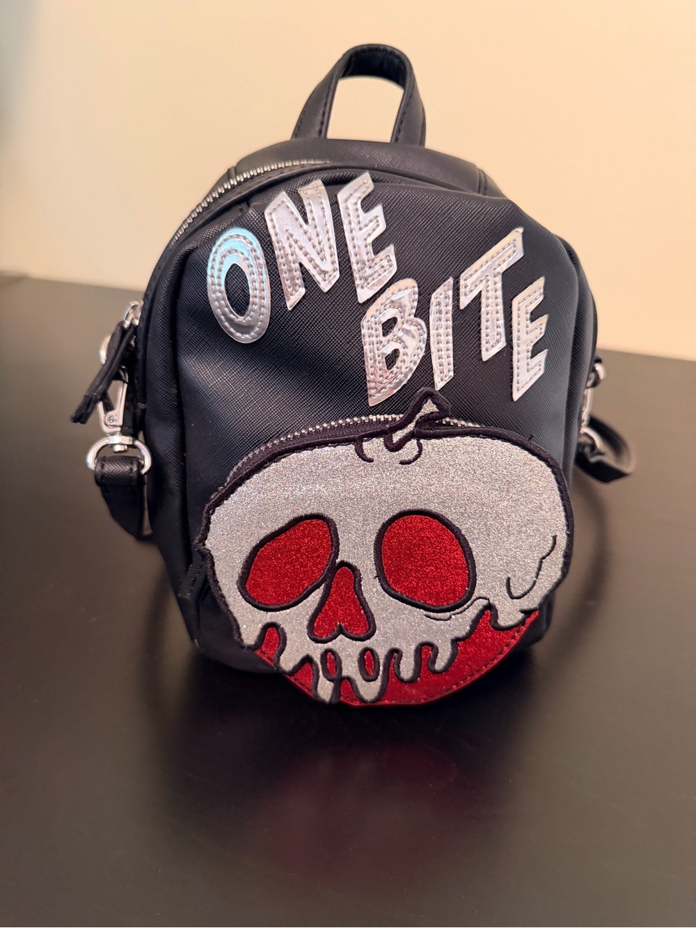 Danielle Nicole Disney Black Mini Backpack with 'One Bite' Skull Patch